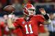 ATLANTA, GA - DECEMBER 01: Quarterback Aaron Murray #11 of the Georgia Bulldogs throws a second half pass against the Alabama Crimson Tide during the SEC Championship Game at the Georgia Dome on December 1, 2012 in Atlanta, Georgia. (Photo by Mike Ehrmann/Getty Images)