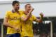LONDON, ENGLAND - AUGUST 24: Lukas Podolski of Arsenal (R) celebrates scoring his side's third goal with team mate Olivier Giroud during the Barclays Premier League match between Fulham and Arsenal at Craven Cottage on August 24, 2013 in London, England. (Photo by Jamie McDonald/Getty Images)
