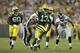 GREEN BAY, WI - AUGUST 23: Vince Young #13 of the Green Bay Packers runs the ball upfield for a Packers first down during the game against the Seattle Seahawks at Lambeau Field on August 23, 2013 in Green Bay, Wisconsin. (Photo by Mike McGinnis/Getty Images)