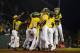 Aug 21, 2013; Williamsport, PA, USA; California (West) player Grant Holman (17) celebrates hitting a home run with teammates during the ninth inning against Connecticut (New England) at the Little League World Series at Lamade Stadium. California defeated Connecticut 6-3 in 9 innings. Mandatory Credit: Howard Smith-USA TODAY Sports