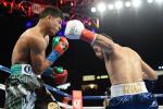Gonzalez KOs Mares in 1st Rd for Featherweight Title