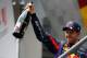 SPA, BELGIUM - AUGUST 25: Sebastian Vettel of Germany and Infiniti Red Bull Racing celebrates on the podium after winning the Belgian Grand Prix at Circuit de Spa-Francorchamps on August 25, 2013 in Spa, Belgium. (Photo by Dean Mouhtaropoulos/Getty Images)