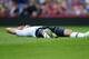 LONDON, ENGLAND - AUGUST 18: Gylfi Sigurdsson of Tottenham Hotspur lies on the pitch during the Barclays Premier League match between Crystal Palace and Tottenham Hotspur at Selhurst Park on Augsut 18, 2013 in London, England. (Photo by Jamie McDonald/Getty Images)