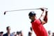 Aug 24, 2013; Jersey City, NJ, USA; Tiger Woods tees off the first hole during the final round of The Barclays at Liberty National Golf Course. Mandatory Credit: Debby Wong-USA TODAY Sports