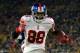 GREEN BAY, WI - JANUARY 15: Hakeem Nicks #88 of the New York Giants celebrates after making a 37 yard touchdown catch with time running out in the second quarter against the Green Bay Packers during their NFC Divisional playoff game at Lambeau Field on January 15, 2012 in Green Bay, Wisconsin. (Photo by Jamie Squire/Getty Images)