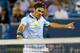 CINCINNATI, OH - AUGUST 13: Roger Federer of Switzerland returns a shot to Philipp Kohlschreiber of Germany during the Western & Southern Open on August 13, 2013 at Lindner Family Tennis Center in Cincinnati, Ohio. (Photo by Ronald Martinez/Getty Images)