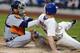 NEW YORK, NY - AUGUST 23: Daniel Murphy #28 of the New York Mets scores past the tag of catcher Victor Martinez #41on a double by Marlon Byrd #6 during the first inning on August 23, 2013 at Citi Field in the Flushing neighborhood of the Queens borough of New York City. (Photo by Rich Schultz/Getty Images)