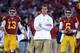 LOS ANGELES, CA - NOVEMBER 24: Head Coach Lane Kiffin of the USC Trojans walks away from Max Wittek #13 and Cody Kessler #6 as they warm up before the game against the Notre Dame Fighting Irish at Los Angeles Memorial Coliseum on November 24, 2012 in Los Angeles, California. (Photo by Harry How/Getty Images)