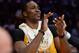 Apr 9, 2013; Los Angeles, CA, USA; Los Angeles Lakers center Dwight Howard (12) on the bench in the second half against the New Orleans Hornets at the Staples Center. Lakers won 104-96. Mandatory Credit: Jayne Kamin-Oncea-USA TODAY Sports