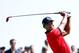 Aug 24, 2013; Jersey City, NJ, USA; Tiger Woods tees off the first hole during the final round of The Barclays at Liberty National Golf Course. Mandatory Credit: Debby Wong-USA TODAY Sports