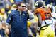 Apr 13, 2013; Ann Arbor, MI, USA; Michigan Wolverines head coach Brady Hoke talks to quarterback Devin Gardner (12) during the Spring Game at Michigan Stadium. Mandatory Credit: Rick Osentoski-USA TODAY Sports