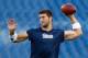 FOXBORO, MA - AUGUST 16: Tim Tebow #5 of the New England Patriots warms up prior to the game against the Tampa Bay Buccaneers at Gillette Stadium on August 16, 2013 in Foxboro, Massachusetts. (Photo by Jared Wickerham/Getty Images)