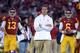 LOS ANGELES, CA - NOVEMBER 24: Head Coach Lane Kiffin of the USC Trojans walks away from Max Wittek #13 and Cody Kessler #6 as they warm up before the game against the Notre Dame Fighting Irish at Los Angeles Memorial Coliseum on November 24, 2012 in Los Angeles, California. (Photo by Harry How/Getty Images)