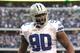 Nov 18, 2012; Arlington, TX, USA; Dallas Cowboys nose tackle Jay Ratliff (90) celebrates making a tackle during the game against the Cleveland Browns at Cowboys Stadium. The Cowboys beat the Browns 23-20 in overtime. Mandatory Credit: Tim Heitman-USA TODAY Sports