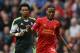 LIVERPOOL, ENGLAND - AUGUST 17: Raheem Sterling of Liverpool moves away from Jermaine Pennant of Stoke City during the Barclays Premier League match between Liverpool and Stoke City at Anfield on August 17, 2013 in Liverpool, England. (Photo by Clive Brunskill/Getty Images)