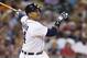 Aug 26, 2013; Detroit, MI, USA; Detroit Tigers third baseman Miguel Cabrera (24) hits a two run home run in the fifth inning against the Oakland Athletics at Comerica Park. Mandatory Credit: Rick Osentoski-USA TODAY Sports