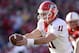January 01, 2013; Orlando, FL, USA; Georgia Bulldogs quarterback Aaron Murray (11) hands the ball off during the second half of the Capital One bowl against the Nebraska Cornhuskers at The Citrus Bowl.Murray was named MVP as Georgia defeated Nebraska 45-31. Mandatory Credit: Brad Barr-USA TODAY Sports