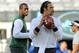 Aug 24, 2013; East Rutherford, NJ, USA; New York Jets quarterback Geno Smith (7) watches as New York Jets quarterback Mark Sanchez (6) drops back to pass during warmups before a game against the New York Giants at MetLife Stadium. Mandatory Credit: Brad Penner-USA TODAY Sports