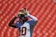 LANDOVER, MD - AUGUST 24: Quarterback Robert Griffin III #10 of the Washington Redskins takes off his helmet before playing the Buffalo Bills during a preseason game at FedExField on August 24, 2013 in Landover, Maryland. (Photo by Patrick Smith/Getty Images)