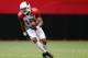 GLENDALE, AZ - JULY 29: Wide receiver Michael Floyd #15 of the Arizona Cardinals runs with the football after a reception during the team training camp at University of Phoenix Stadium on July 29, 2013 in Glendale, Arizona. (Photo by Christian Petersen/Getty Images)