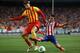 MADRID, SPAIN - AUGUST 21: Gerard Pique (L) of FC Barcelona competes for the ball with David Villa (R) of Atletico de Madrid during the Spanish Super Cup first leg match between Club Atletico de Madrid and FC Barcelona at Vicente Calderon Stadium on August 21, 2013 in Madrid, Spain. (Photo by Gonzalo Arroyo Moreno/Getty Images)