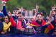 MADRID, SPAIN - MAY 18: Raul Garcia (L) Jand uan Francisco 'Juanfran' of Atletico de Madrid celebrate with the trophy from an open-top bus a day after winning the Copa del Rey Final against Real Madrid on May 18, 2013 in Madrid, Spain. (Photo by Denis Doyle/Getty Images)