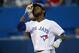 TORONTO, CANADA - JULY 26: Jose Reyes #7 of the Toronto Blue Jays celebrates his solo home run in the third inning during MLB game action against the Houston Astros on July 26, 2013 at Rogers Centre in Toronto, Ontario, Canada. (Photo by Tom Szczerbowski/Getty Images)