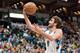 Mar 27, 2013; Minneapolis, MN, USA; Minnesota Timberwolves point guard Ricky Rubio (9) shoots a layup against the Los Angeles Lakers in the third quarter at Target Center. Lakers won 120-117. Mandatory Credit: Greg Smith-USA TODAY Sports