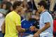 CINCINNATI, OH - AUGUST 16: (L-R) Rafael Nadal of Spain shakes hands at the net with Roger Federer of Switzerland after their Men's Singles quarterfinals match during the Western & Southern Open on August 16, 2013 at Lindner Family Tennis Center in Cincinnati, Ohio. (Photo by Ronald Martinez/Getty Images)
