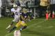 SOUTH BEND, IN - OCTOBER 13: T.J. Jones #7 of the Notre Dame Fighting Irish catches the game-winning touchdown pass in overtime in front of Terrence Brown #6 of the Standford Cardinal at Notre Dame Stadium on October 13, 2012 in South Bend, Indiana. Notre Dame defeated Stanford 20-13 in overtime. (Photo by Jonathan Daniel/Getty Images)