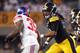PITTSBURGH, PA - AUGUST 10: Jarvis Jones #95 of the Pittsburgh Steelers pursues Andre Brown #35 of the New York Giants during the game on August 10, 2013 at Heinz Field in Pittsburgh, Pennsylvania. (Photo by Justin K. Aller/Getty Images)