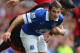 LIVERPOOL, ENGLAND - AUGUST 24: Leighton Baines of Everton holds off a challenge from Shane Long of West Bromwich Albion during the Barclays Premier League match between Everton and West Bromwich Albion at Goodison Park on August 24, 2013 in Liverpool, England. (Photo by Alex Livesey/Getty Images)