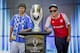 PRAGUE, CZECH REPUBLIC - AUGUST 03: Fans of Bayern Munchen and Chelsea FC pose next to UEFA Super Cup trophy during the UEFA Trophy Display Event on August 3, 2013 in Prague, Czech Republic. (Photo by Matej Divizna/Getty Images for UEFA)