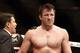 Aug 17, 2013; Boston, MA, USA; Chael Sonnen is congratulated after defeating Shogun Rua during a UFC Light Heavyweight match at the TD Garden. Sonnen won in one round by a knockout. Mandatory Credit: Winslow Townson-USA TODAY Sports