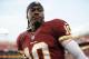 Aug 19, 2013; Landover, MD, USA; A Washington Redskins quarterback Robert Griffin III (10) walks off the field after warm ups prior to the Redskins game against the Pittsburgh Steelers at FedEx Field. The Redskins won 24-13. Mandatory Credit: Geoff Burke-USA TODAY Sports