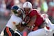 STANFORD, CA - NOVEMBER 10: Drew Terrell #4 of the Stanford Cardinal is tackled by Sean Martin #6 and Ryan Murphy #25 of the Oregon State Beavers at Stanford Stadium on November 10, 2012 in Stanford, California. (Photo by Ezra Shaw/Getty Images)