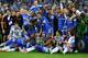 MUNICH, GERMANY - MAY 19: Chelsea players celebrate with the trophy after their victory in the UEFA Champions League Final between FC Bayern Muenchen and Chelsea at the Fussball Arena München on May 19, 2012 in Munich, Germany. (Photo by Alex Livesey/Getty Images)