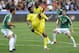 GROZNY, RUSSIA - MAY 12: Samuel Eto'o (C) of FC Anzhi Makhachkala is challenged by Rizvan Utsiyev and Marcin Komorowski of FC Terek Grozny during the Russian Premier League match between FC Terek Grozny and FC Anzhi Makhachkala at the Akhmad-Arena Stadium on May 12, 2013 in Grozny, Russia. (Photo by Sergey Rasulov Jr/Epsilon/Getty Images)