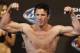 Aug 16, 2013; Boston, MA, USA; Chael Sonnen flexes during the weigh-in for his UFC fight at TD Garden. Mandatory Credit: Winslow Townson-USA TODAY Sports