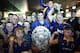 DUNEDIN, NEW ZEALAND - AUGUST 24: Otago captain Paul Grant poses for a photo with adoring fans as they celebrate the Ranfurly Shield arriving in Dunedin on August 24, 2013 in Dunedin, New Zealand. (Photo by Rob Jefferies/Getty Images)