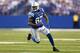 INDIANAPOLIS, IN - AUGUST 24: Reggie Wayne #87 of Indianapolis Colts runs with the ball during the preseason game against the Cleveland Browns at Lucas Oil Stadium on August 24, 2013 in Indianapolis, Indiana. (Photo by Andy Lyons/Getty Images)