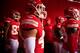 KANSAS CITY, MO - AUGUST 29: Head coach Andy Reid of the Kansas City Chiefs greets players as they walk through the tunnel onto the field prior to the preseason game against the Green Bay Packers on at Arrowhead Stadium on August 29, 2013 in Kansas City, Missouri. (Photo by Jamie Squire/Getty Images)