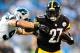 CHARLOTTE, NC - AUGUST 29: Jonathan Dwyer #27 of the Pittsburgh Steelers stiff-arms Chase Blackburn #93 of the Carolina Panthers during a preseason NFL game at Bank of America Stadium on August 29, 2013 in Charlotte, North Carolina. (Photo by Grant Halverson/Getty Images)