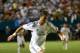 MIAMI GARDENS, FL - AUGUST 07: Cristiano Ronaldo #7 of Real Madrid drives to the goal during International Champions Cup Championship match against Chelsea at Sun Life Stadium on August 7, 2013 in Miami Gardens, Florida. (Photo by Mike Ehrmann/Getty Images)