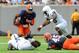 Aug 31, 2013; East Rutherford, NJ, USA; Syracuse Orange running back Ashton Broyld (1) runs with around the tackle attempt of Penn State Nittany Lions defensive end Deion Barnes (18) during the first quarter at MetLife Stadium. Mandatory Credit: Rich Barnes-USA TODAY Sports