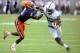 Aug 31, 2013; East Rutherford, NJ, USA; Penn State Nittany Lions wide receiver Brandon Felder (85) eludes the tackle attempt of Syracuse Orange cornerback Keon Lyn (8) during the second quarter at MetLife Stadium. Mandatory Credit: Rich Barnes-USA TODAY Sports