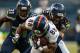 SEATTLE, WA - AUGUST 17: Cornerback Richard Sherman #25 of the Seattle Seahawks tackles wide receiver Demaryius Thomas #88 of the Denver Broncos at CenturyLink Field on August 17, 2013 in Seattle, Washington. (Photo by Otto Greule Jr/Getty Images)