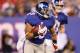 EAST RUTHERFORD, NJ - NOVEMBER 20: Da'Rel Scott #33 of the New York Giants runs with the ball against the Philadelphia Eagles at MetLife Stadium on November 20, 2011 in East Rutherford, New Jersey. (Photo by Al Bello/Getty Images)