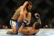 Aug 31, 2013; Milwaukee, WI, USA; Benson Henderson (left) fights Anthony Pettis during the UFC-164 bout at BMO Harris Bradley Center. at BMO Harris Bradley Center. Mandatory Credit: Benny Sieu-USA TODAY Sports