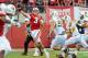 LINCOLN, NE - AUGUST 31: Quarterback Taylor Martinez #3 of the Nebraska Cornhuskers throws over the Wyoming Cowboys during their game at Memorial Stadium on August 31, 2013 in Lincoln, Nebraska. (Photo by Eric Francis/Getty Images)